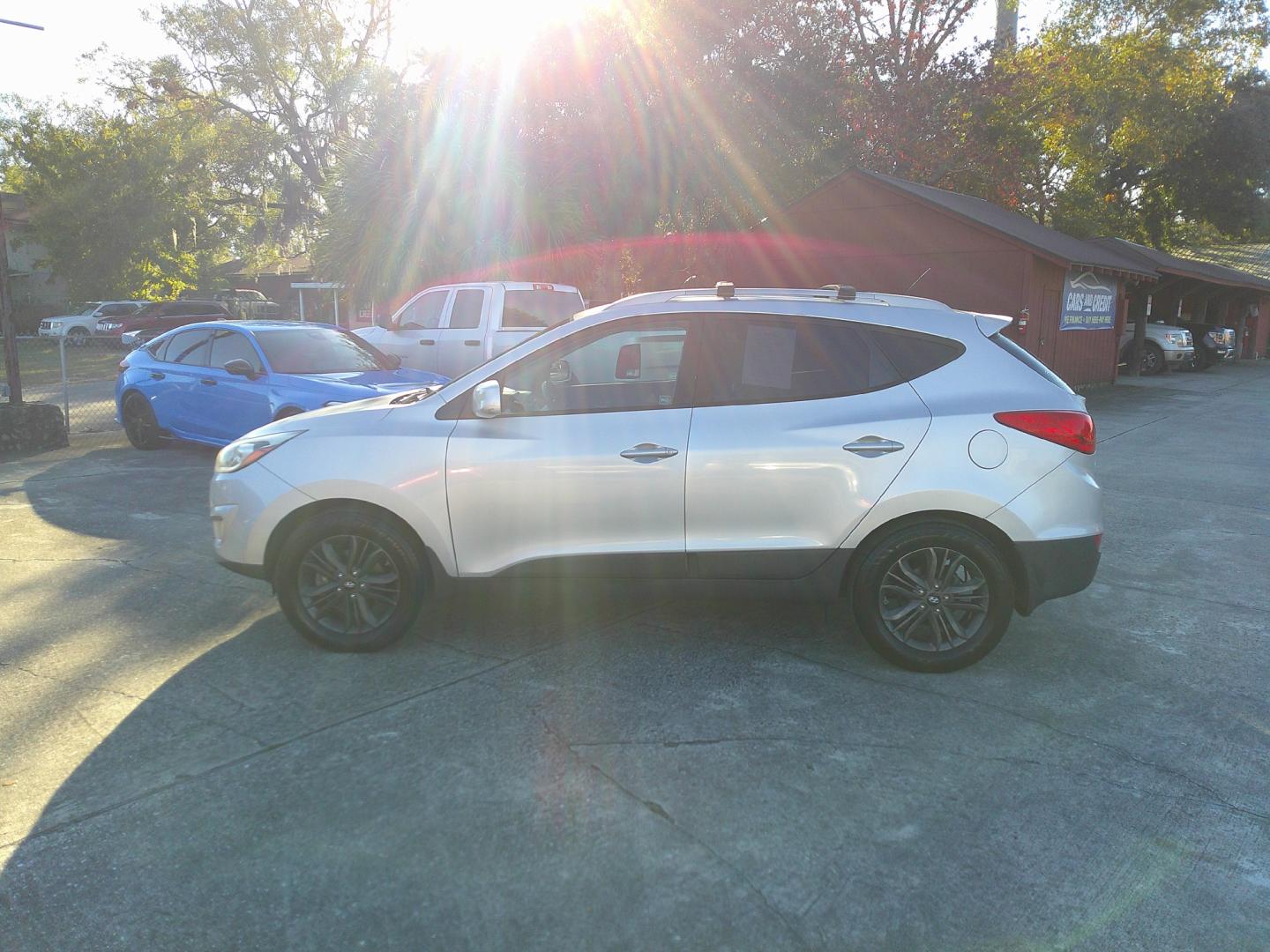 2014 SILVER HYUNDAI TUCSON LIMITED; SE (KM8JU3AG4EU) , located at 10405 Abercorn Street, Savannah, GA, 31419, (912) 921-8965, 31.988262, -81.131760 - Photo#1